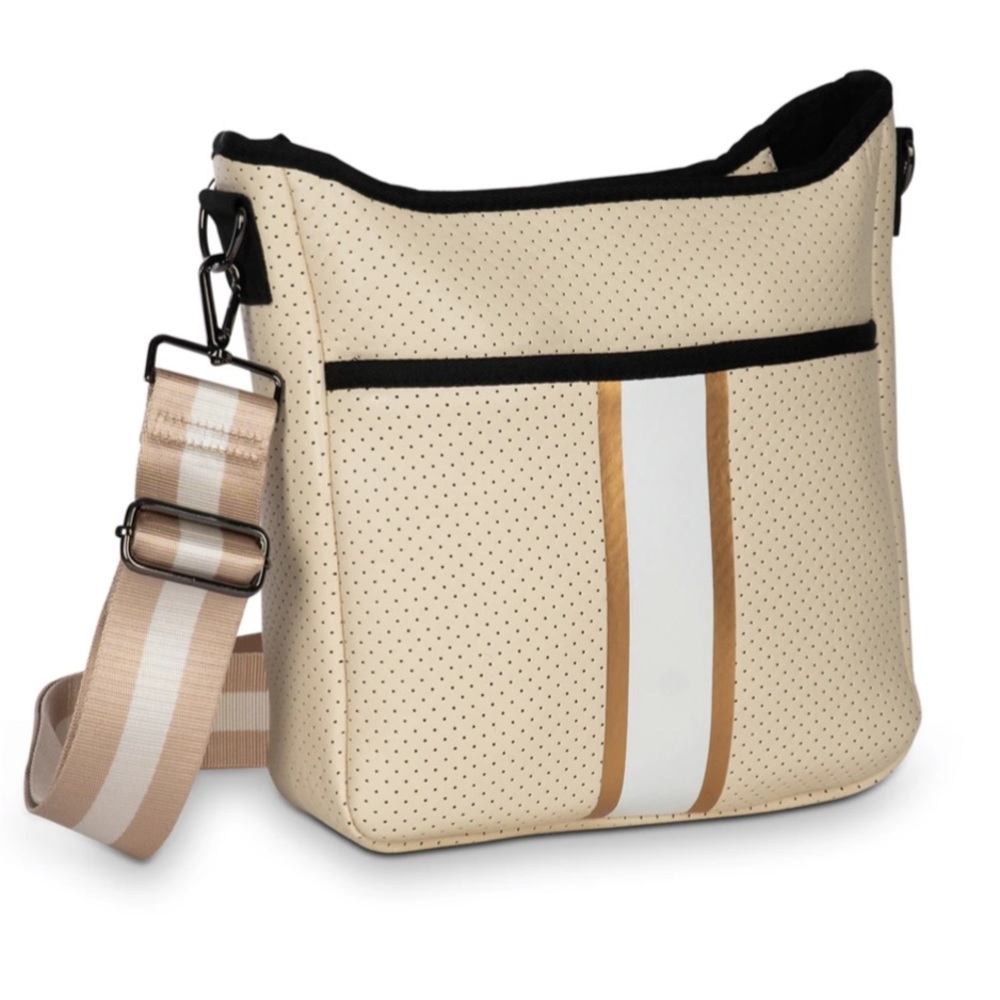 Haute Shore Blake Deluxe Crossbody Bag in the "Dune" style.